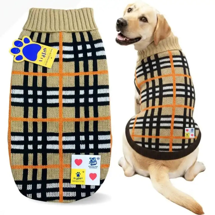 A dog sweater shown both flat and modeled by a yellow Labrador Retriever. The sweater features a beige ribbed collar and cuffs, a black and white plaid pattern with orange grid lines, and a brown trim.