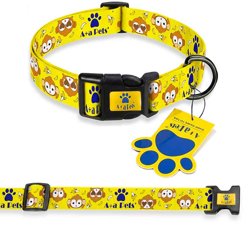 Yellow dog collar with cartoon dog design and brand tag on a white background