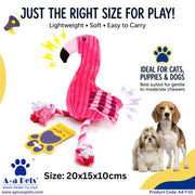 Pink plush flamingo dog toy with striped pink-and-white tail and red tassel ends, shown on a white background with promotional text, a paw-print tag, and photos of a dog and cat.