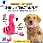 A golden retriever dog is shown holding a pink plush and cotton rope interactive tug toy in its mouth, with the toy also displayed separately on the left. The image includes text labels pointing out the soft plush body, cotton rope, and clip, along with the brand logo 'A+a Pets' at the top left.