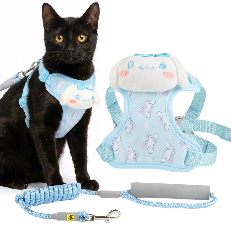 A black cat wearing a light blue Cinnamoroll-themed pet harness and leash, shown alongside the harness and leash laid out on a white background.
